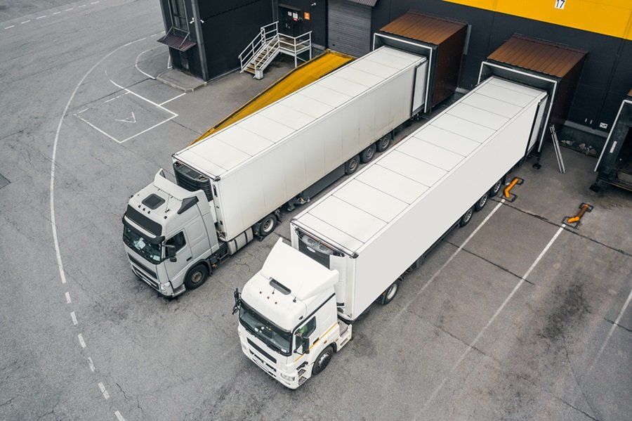 Freight trucks at a loading area, seen from above